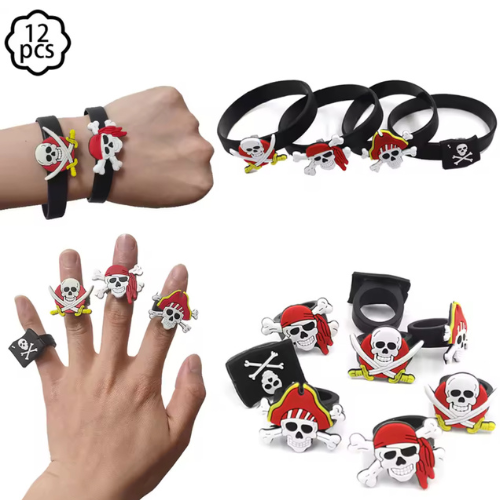 Pirate-themed accessories including bracelets and rings on a white background