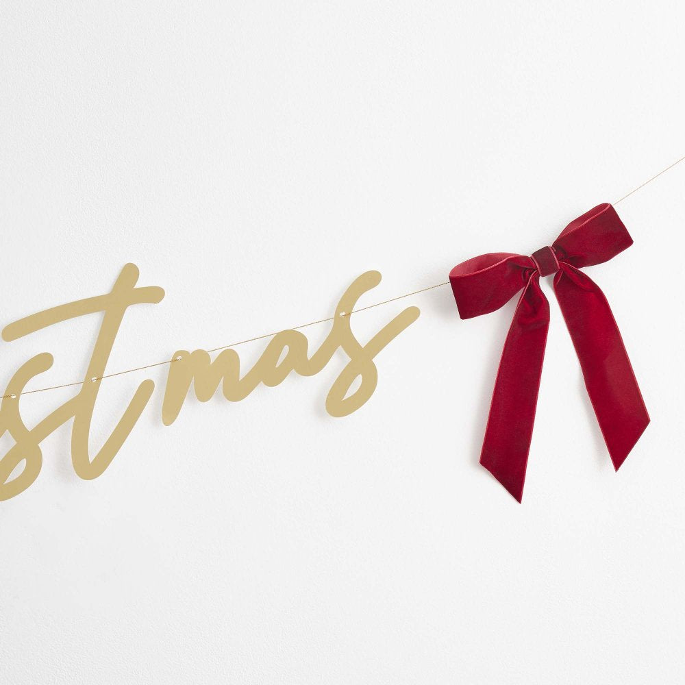 Merry Christmas Gold Banner with Red Velvet Bows